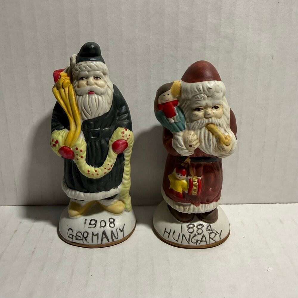 Vintage heilig-meyers “Santa’s around the world” porcelain figures set of 2